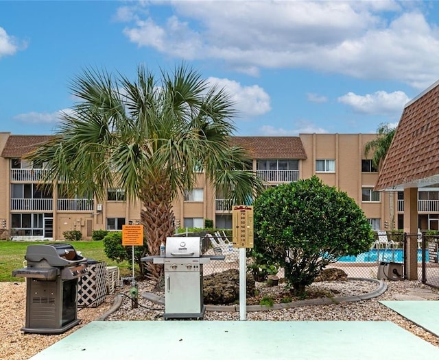 view of home's community featuring a swimming pool