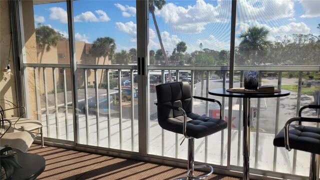 1540 Glen Oaks Dr E Unit B336, Sarasota, FL 34232 - sunroom / solarium featuring healthy amount of natural light