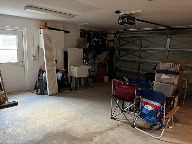 garage featuring a garage door opener