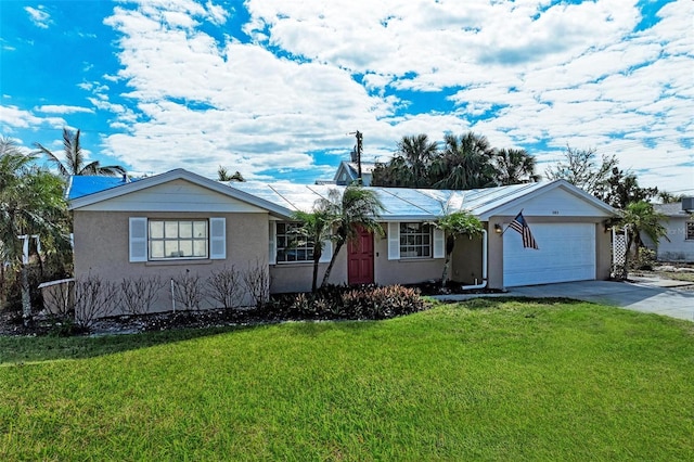 ranch-style home featuring a front yard and a garage