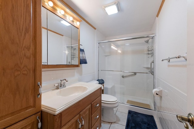 1640 Center Rd, Terra Ceia, FL 34250 - bathroom featuring a stall shower, vanity, toilet, and tile patterned flooring