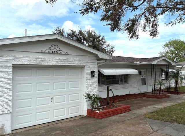 ranch-style house with a garage