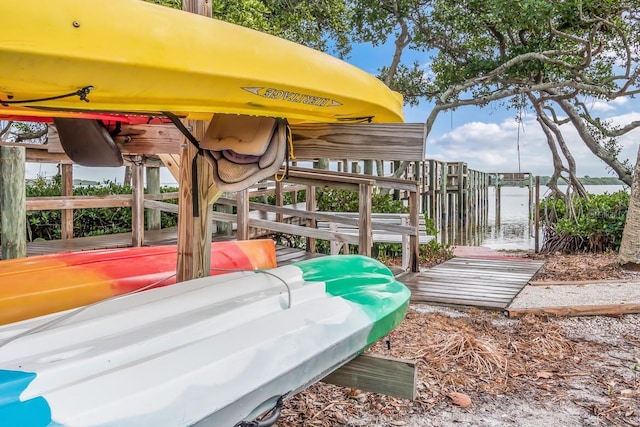 view of patio / terrace featuring a deck with water view