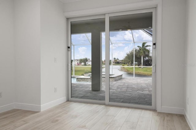 doorway to outside featuring light hardwood / wood-style flooring