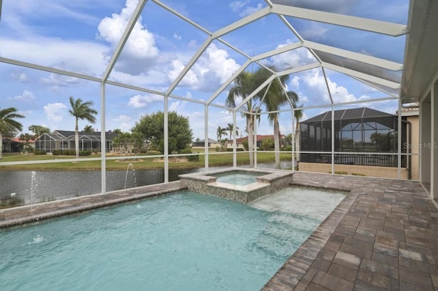 view of swimming pool featuring a patio area, glass enclosure, and an in ground hot tub