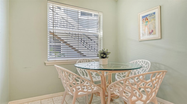 dining room featuring light tile patterned floors