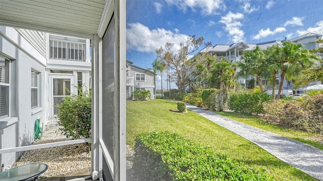 1328 Siesta Bayside Dr Unit 1328-C, Sarasota, FL 34242 - view of green lawn featuring a residential view
