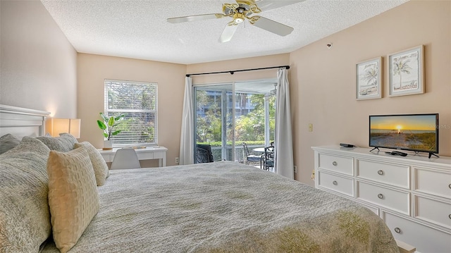 bedroom with access to outside, multiple windows, a textured ceiling, and ceiling fan