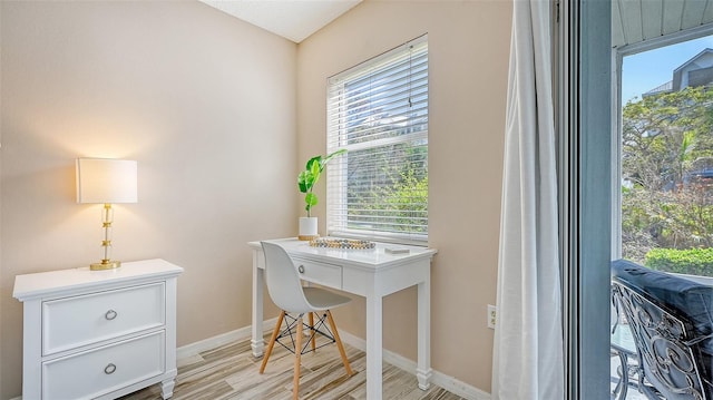 1328 Siesta Bayside Dr Unit 1328-C, Sarasota, FL 34242 - office with light wood-type flooring and baseboards