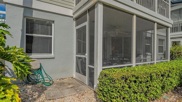 exterior space with a sunroom