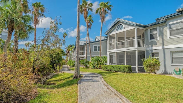 1328 Siesta Bayside Dr Unit 1328-C, Sarasota, FL 34242 - view of community with a yard