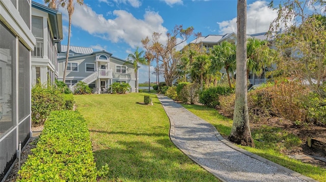1328 Siesta Bayside Dr Unit 1328-C, Sarasota, FL 34242 - view of property's community featuring a lawn