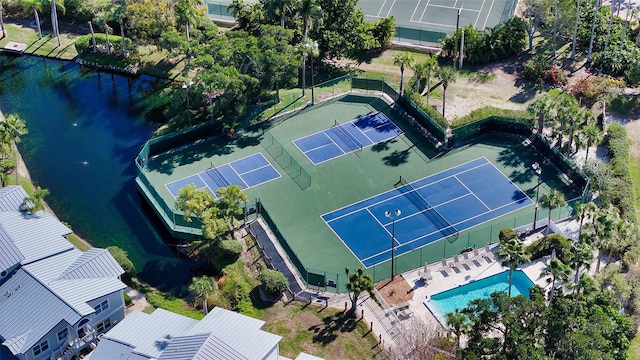 drone / aerial view with a water view