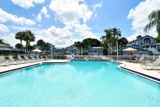 view of swimming pool with a patio