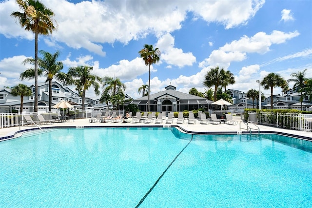 view of swimming pool with a patio