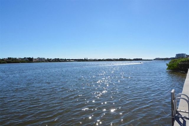 exterior space with a water view