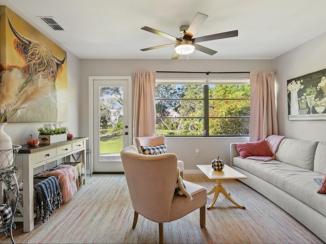 living room with ceiling fan