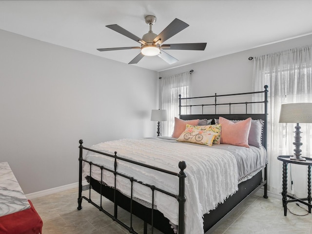 bedroom featuring ceiling fan