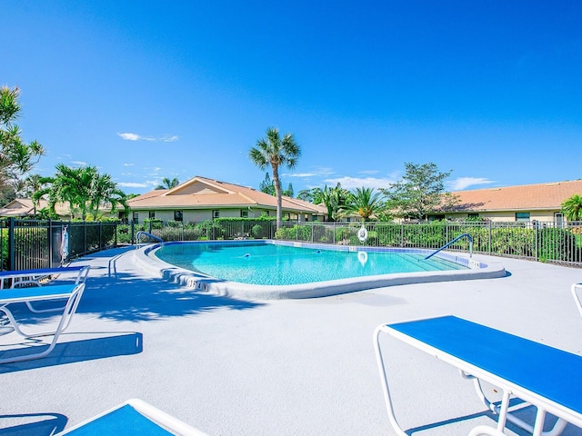 view of swimming pool featuring a patio