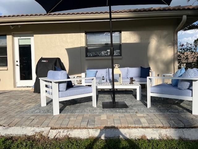 view of patio featuring a grill and outdoor lounge area