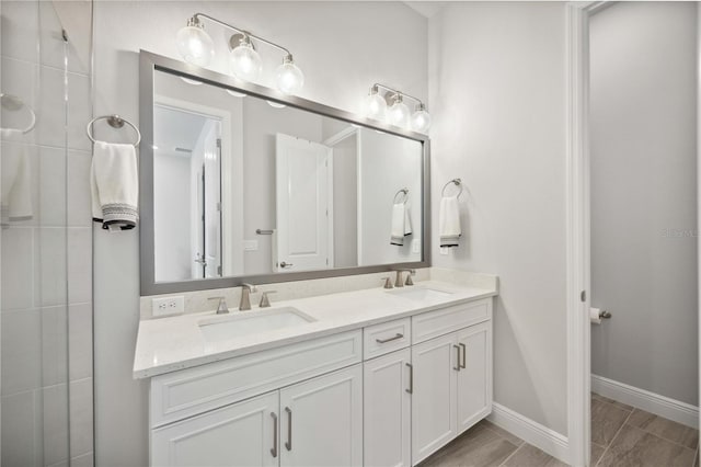 bathroom featuring hardwood / wood-style floors and vanity