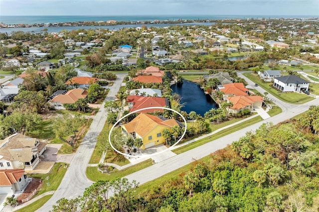 drone / aerial view with a water view