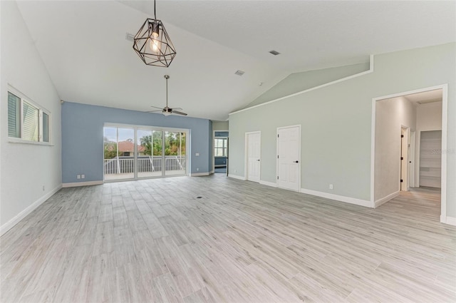 unfurnished living room with ceiling fan, light wood-type flooring, and lofted ceiling