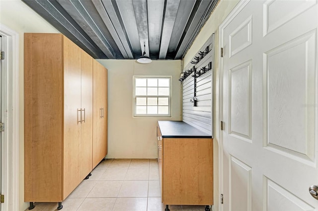 mudroom featuring light tile patterned flooring