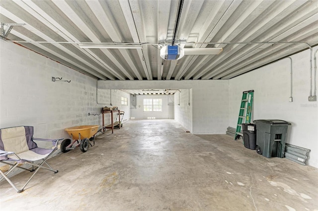 garage featuring a garage door opener