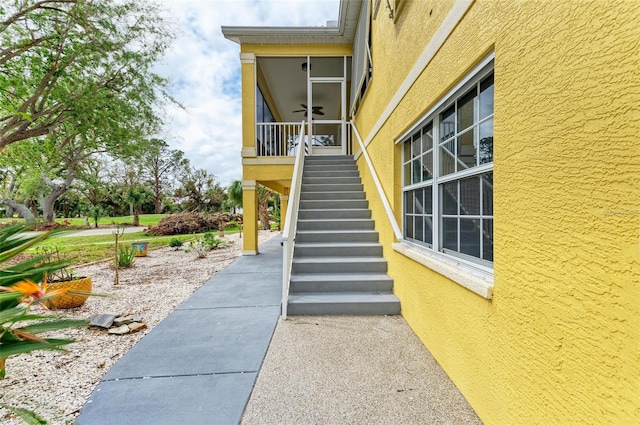 view of property exterior with ceiling fan