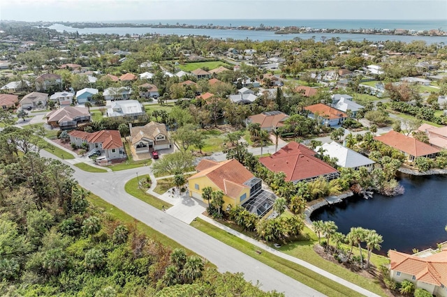 drone / aerial view with a water view