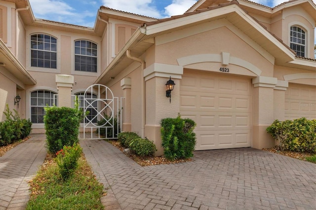 property entrance featuring a garage