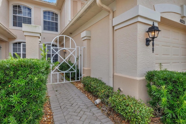 property entrance featuring a garage