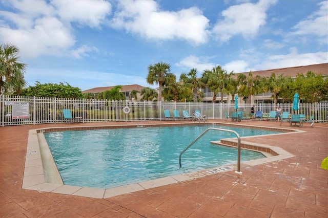 view of swimming pool featuring a patio