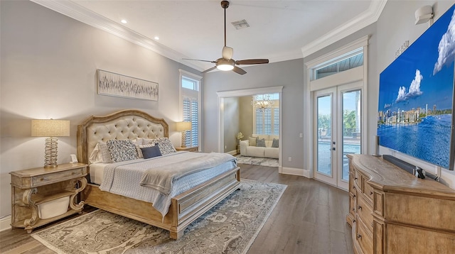 bedroom with french doors, wood-type flooring, crown molding, access to exterior, and ceiling fan