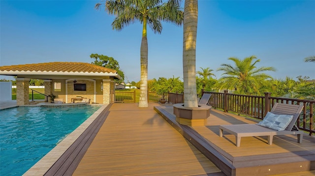 view of pool featuring a wooden deck