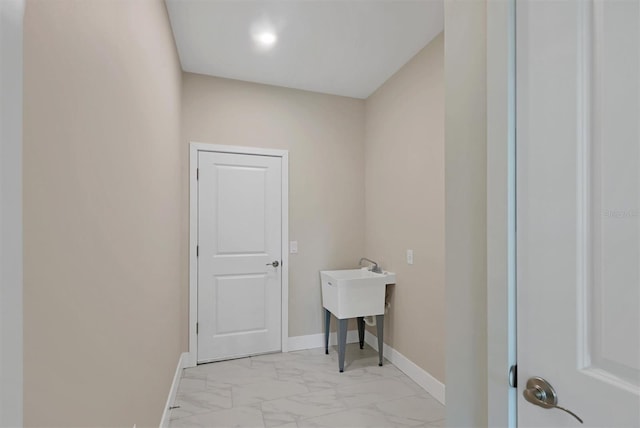 2814 Daphne Rd, North Port, FL 34288 - washroom with light marble finish floors and baseboards