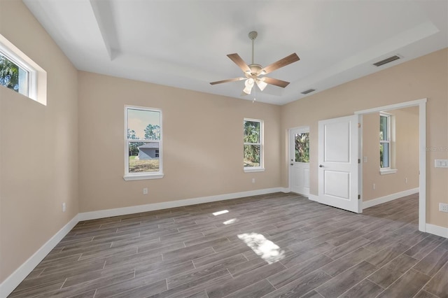 unfurnished room featuring light hardwood / wood-style floors and plenty of natural light