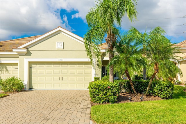 view of front of home with a garage