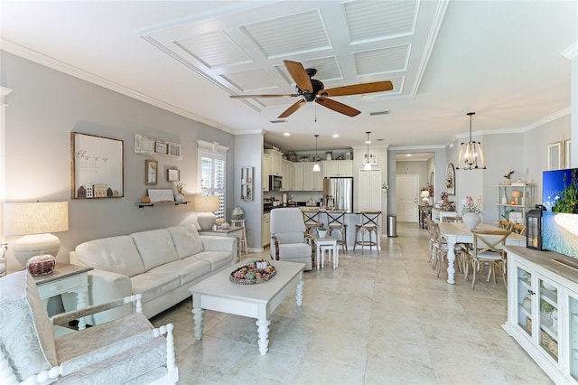 tiled living room with coffered ceiling, ornamental molding, and ceiling fan with notable chandelier