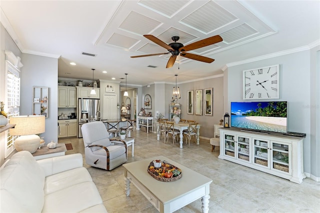 tiled living room with ceiling fan and ornamental molding