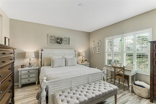 bedroom with light hardwood / wood-style flooring