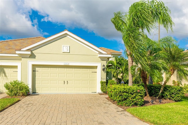 view of front of property featuring a garage