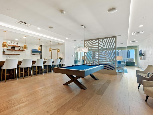 playroom with billiards, light wood-type flooring, and floor to ceiling windows