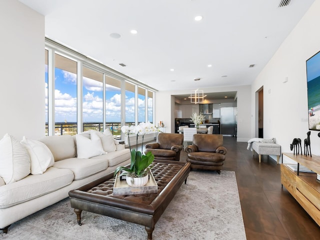 540 N Tamiami Trl Unit 1201, Sarasota, FL 34236 - living room featuring a chandelier and recessed lighting