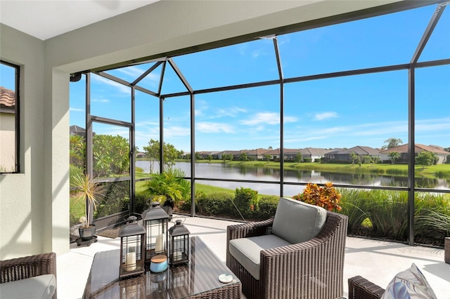 sunroom with a water view