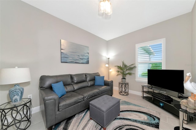 living room with tile patterned flooring