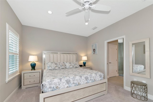 bedroom featuring ceiling fan and light colored carpet