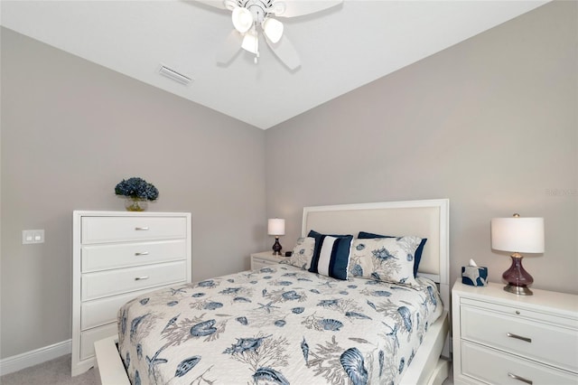 carpeted bedroom featuring vaulted ceiling and ceiling fan