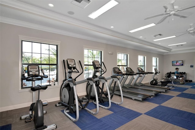 exercise room with crown molding and ceiling fan